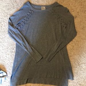 Grey long sleeved